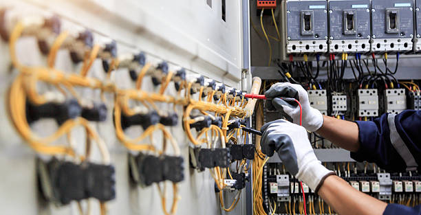 Professional Electrician technician working in Peachtree Corners, GA